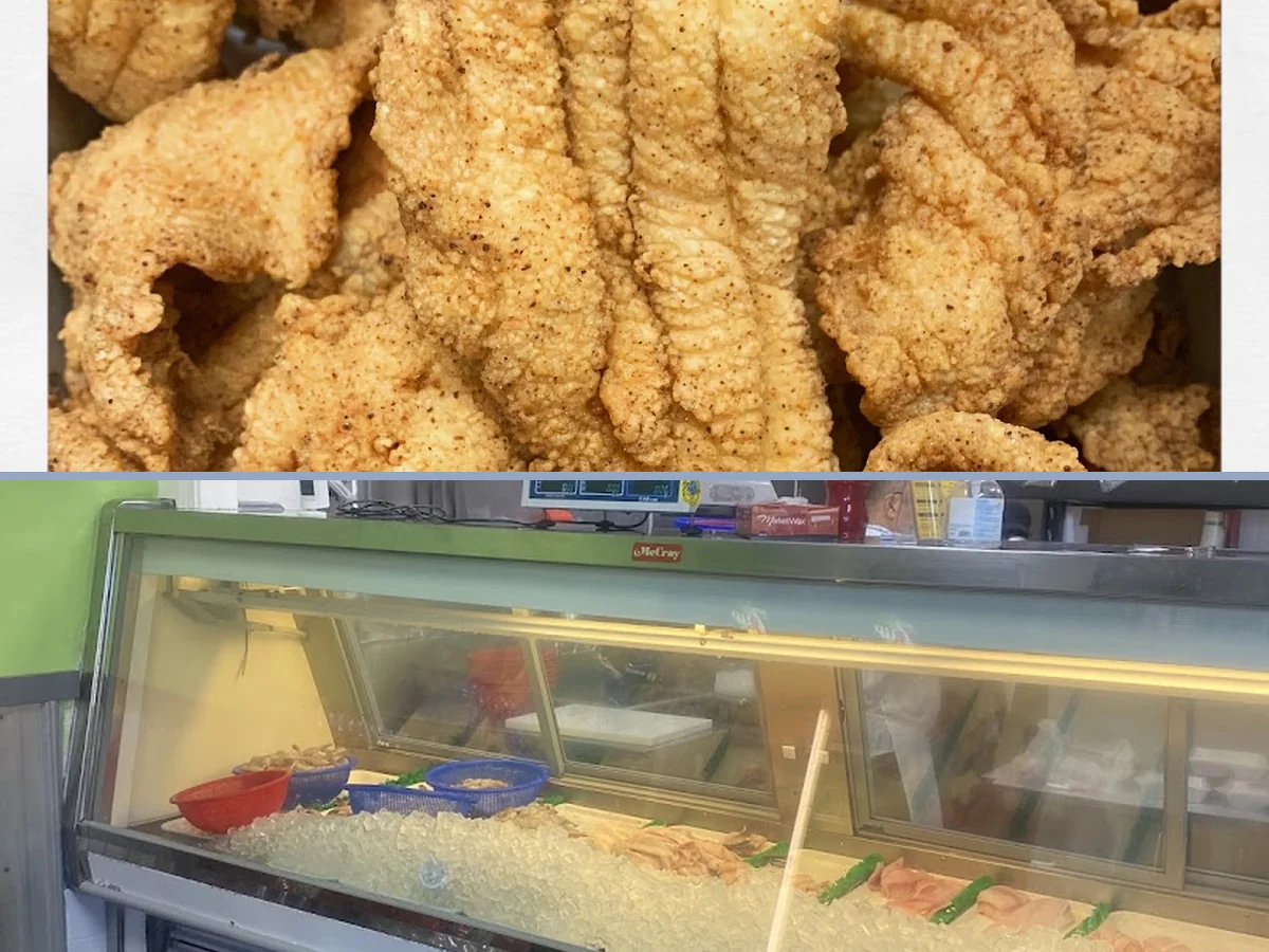 Fresh fish displayed on a market counter.